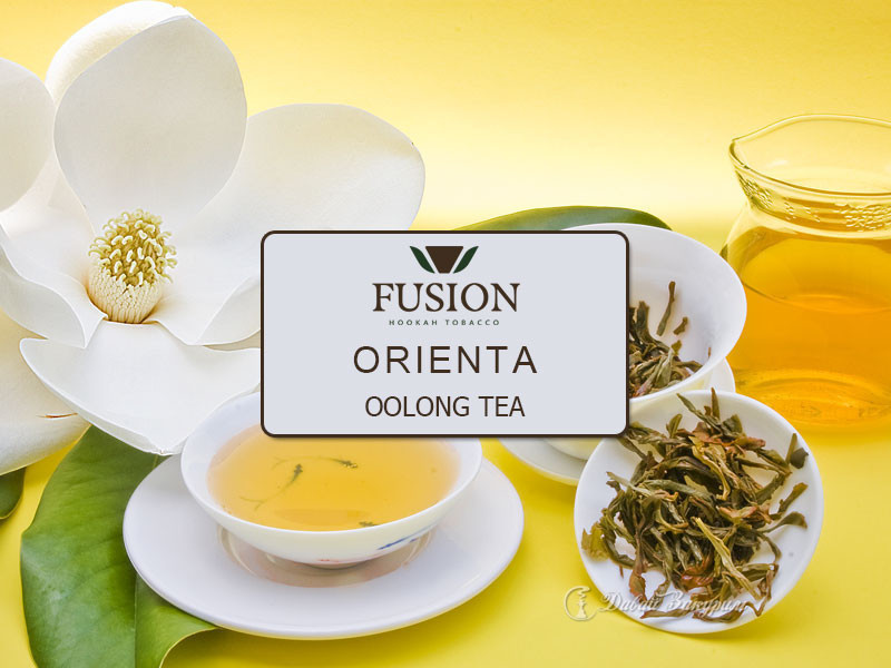 fusion-oriental-oolong-tea-fermentirovannyi-chai-piala-s-napitkom-i-belyi-tsvetok